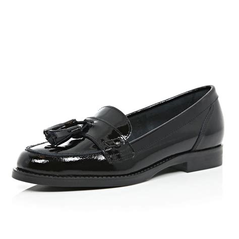 Mocassins en cuir verni Noir .